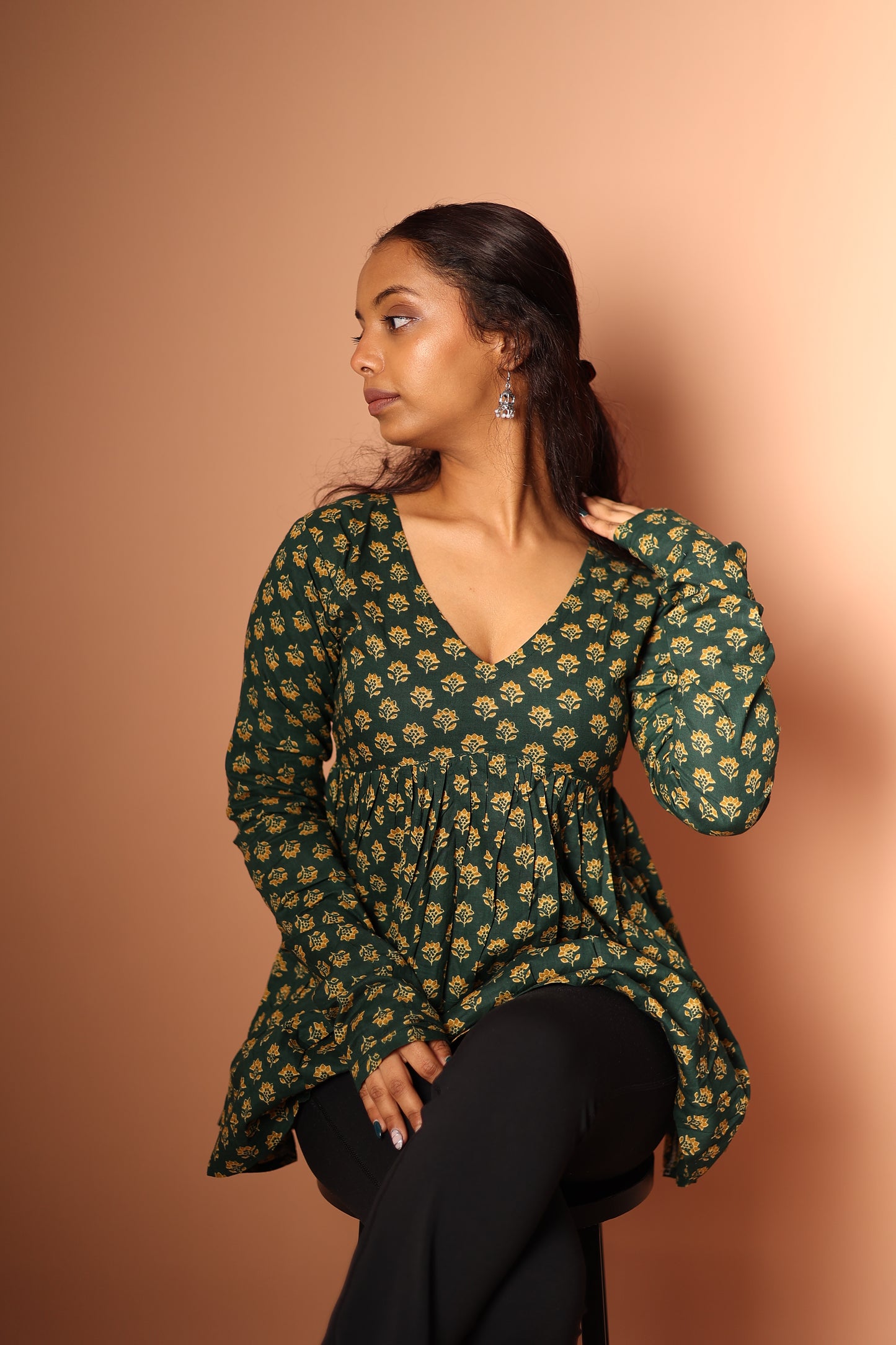 Peplum Top in Bottle green